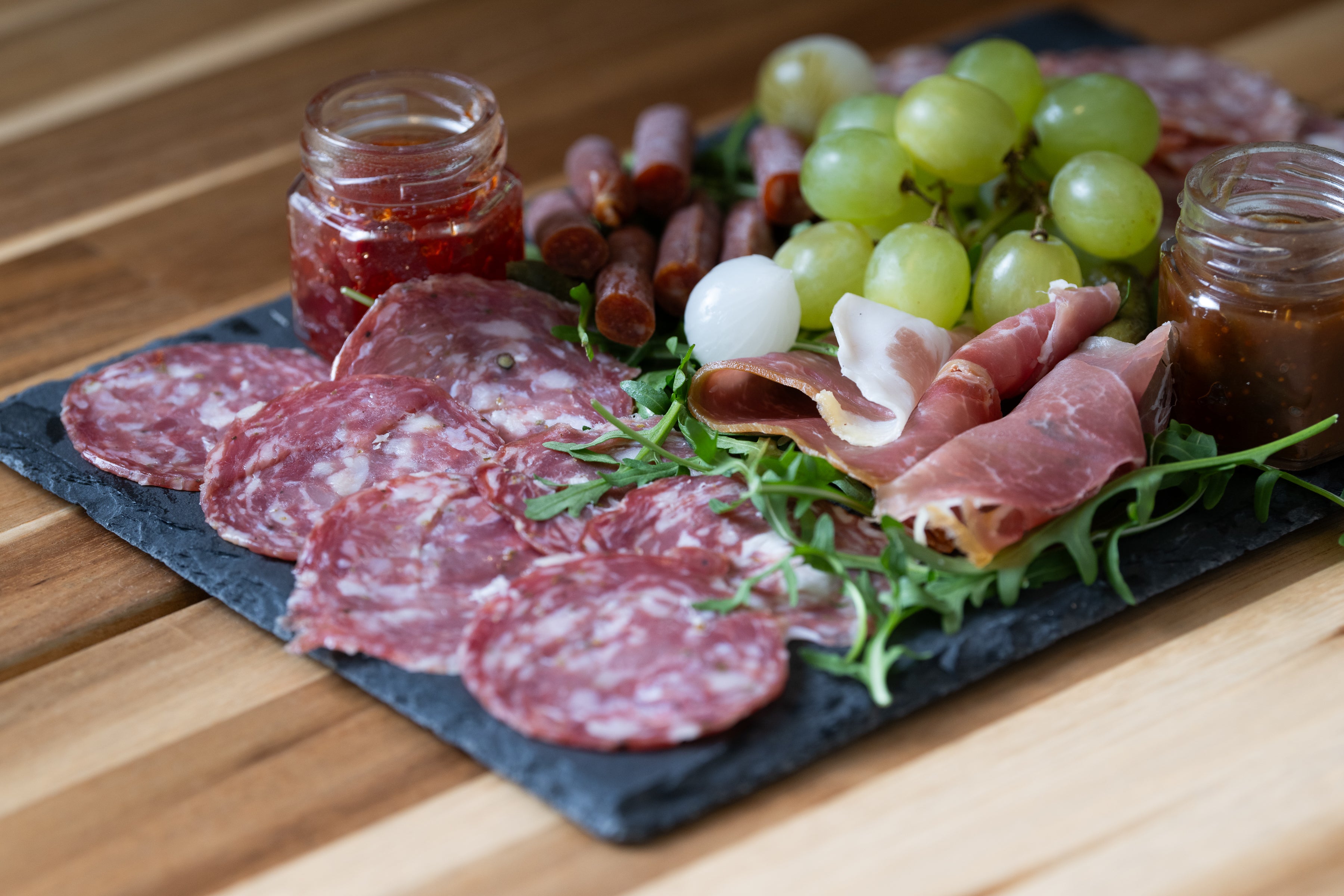 Kent Charcuterie Selection- British Saucisson, Salami, Chorizo and pepperoni Sticks made by hand on a farm in neighboring Tenterden. Pickles, chutneys. Serves 2
